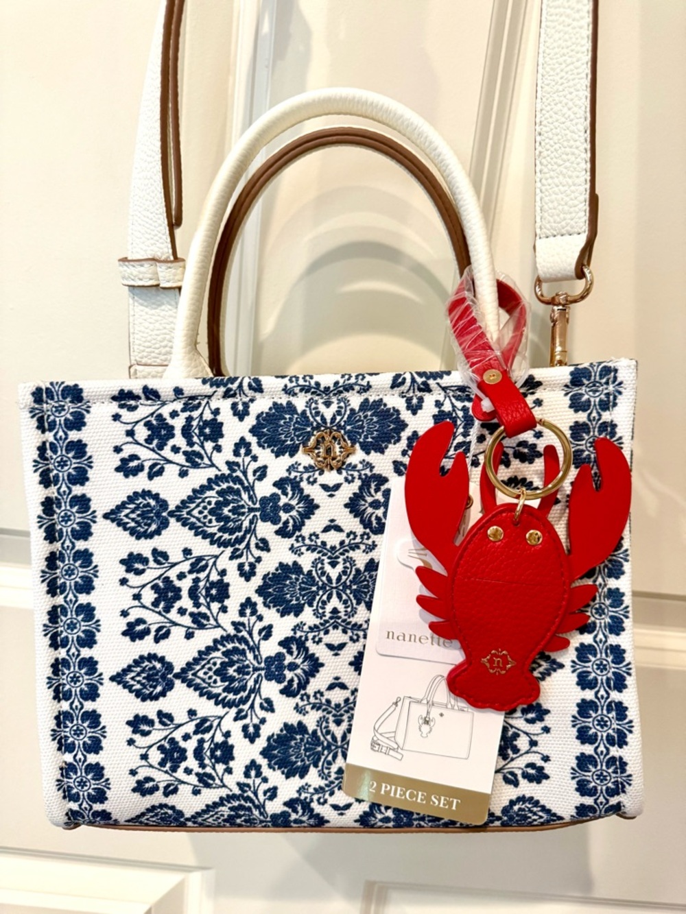 NWT Nanette Lepore White &Navy Floral sachel tote with Red Lobster Charm Keyring